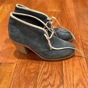 Blue suede heeled boots